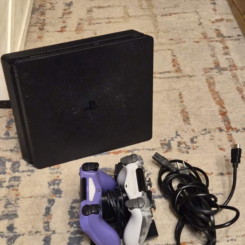 PS4 w/2 Controllers & Stand